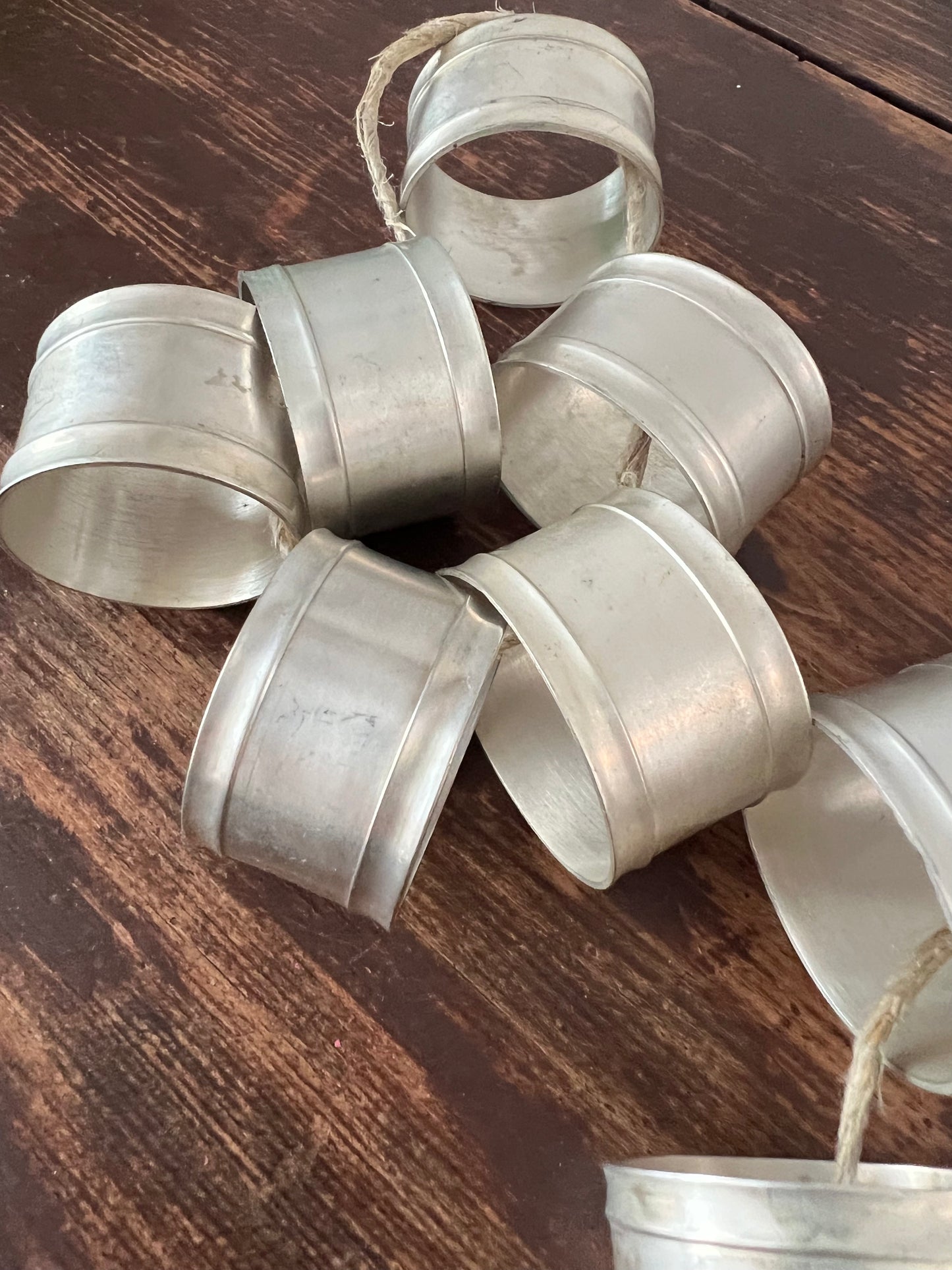 12 servettringar i nysilver