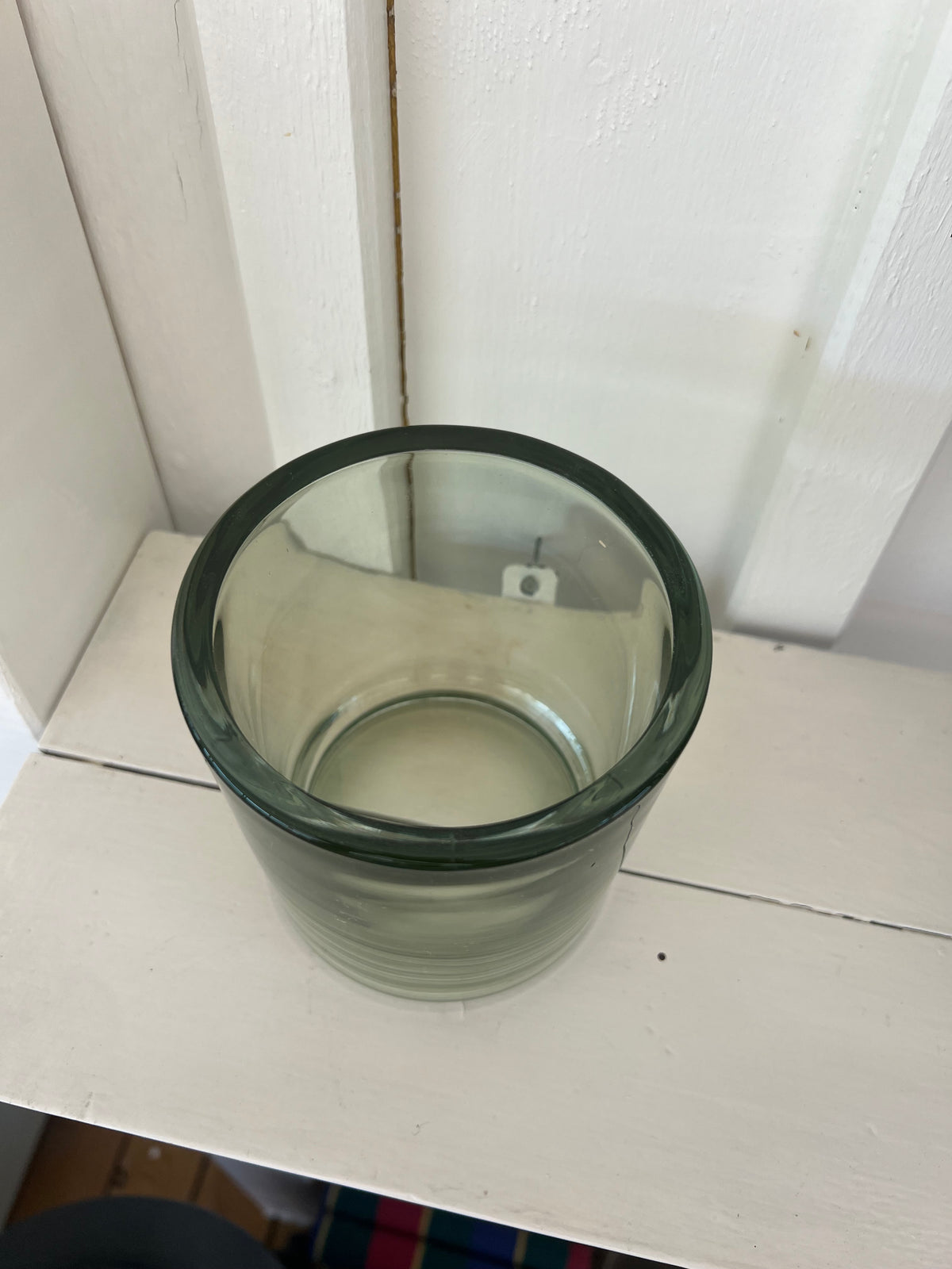 Stor ljuslykta i grönt glas