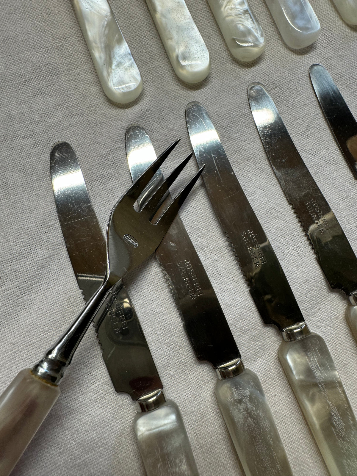 12 delar små bestick i pärlemor