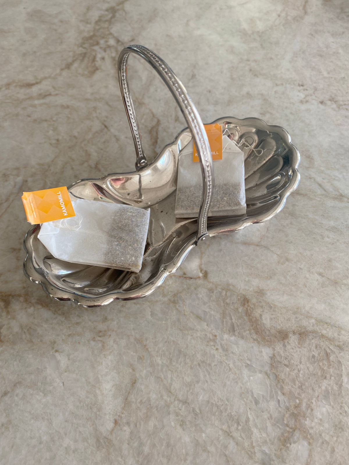 Dubbelt snäckfat med handtag