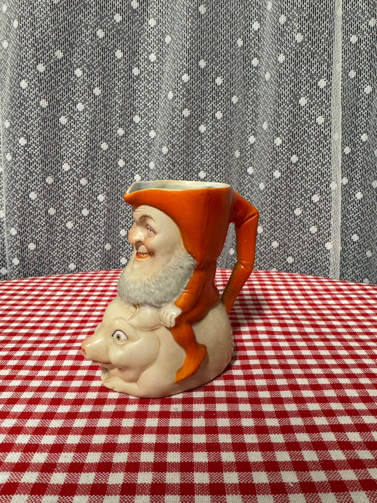 Kanna i porslin, tomte på gris, 1900-talets början
