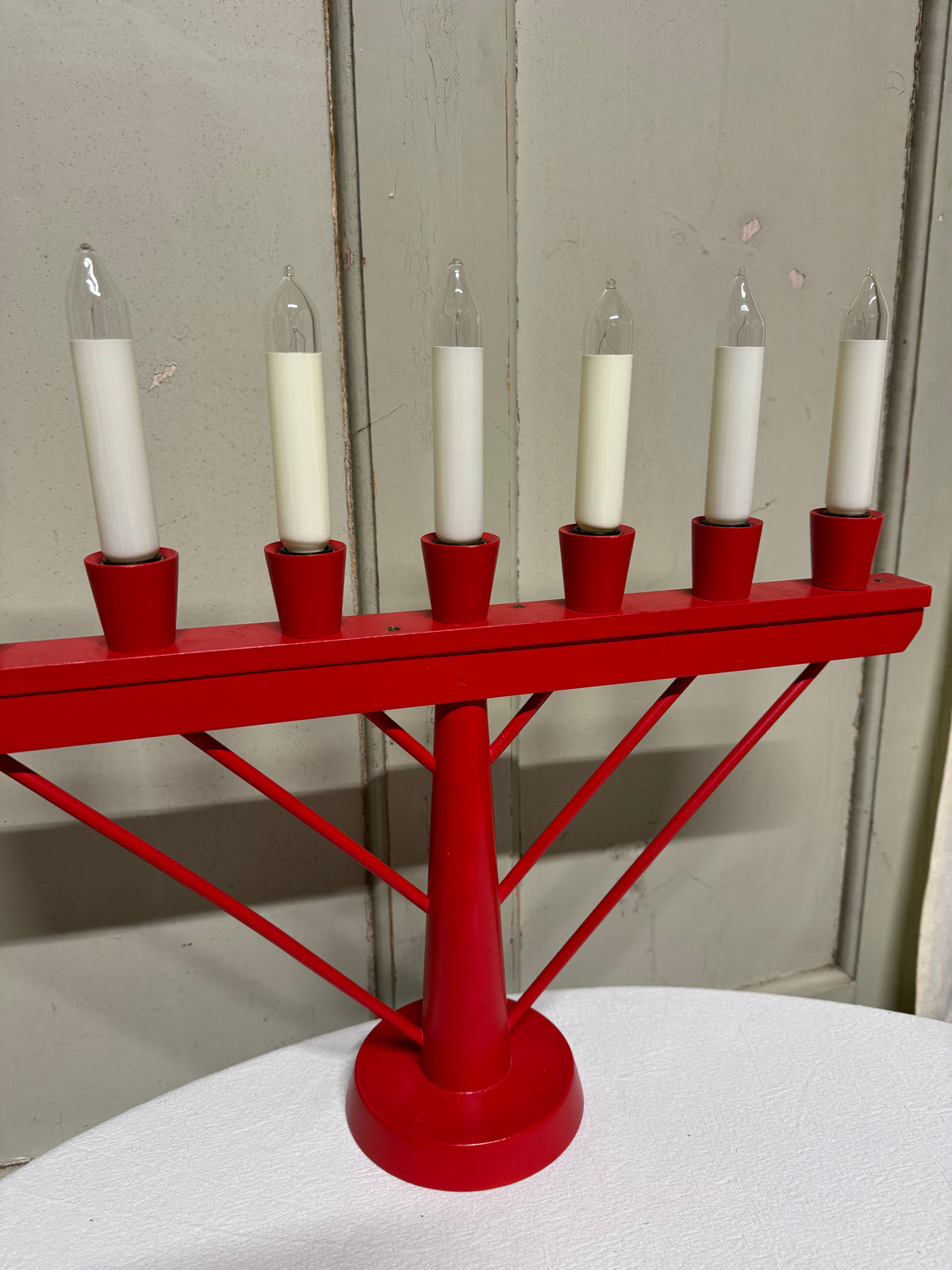 Röd adventsljusstake