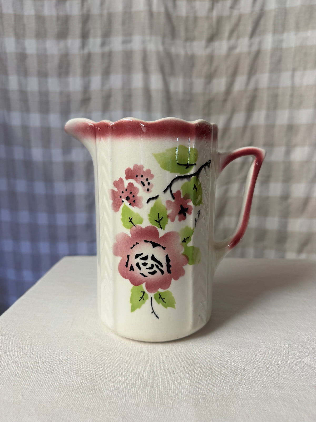 Kanna i grönt och rosa