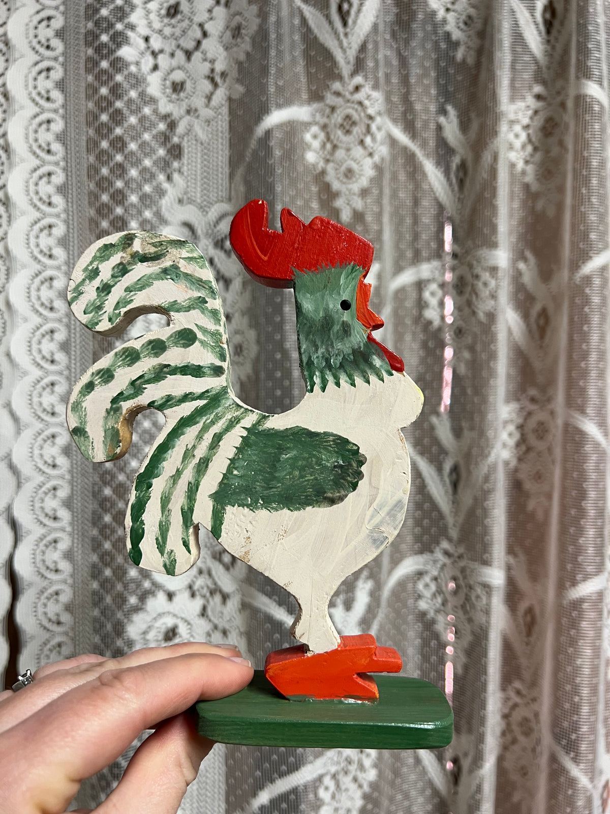Äldre tupp i trä