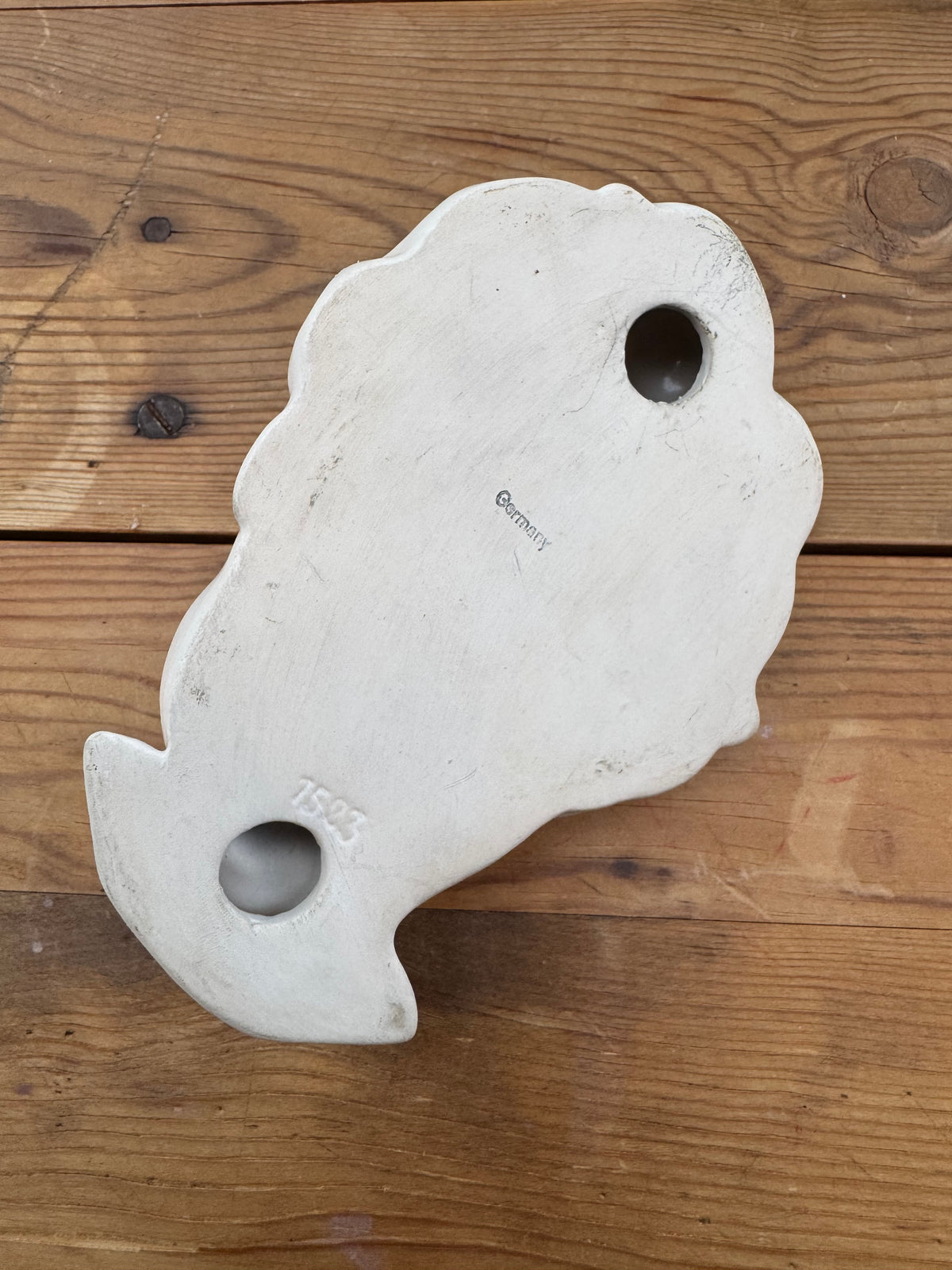 Väggskulptur ansikte