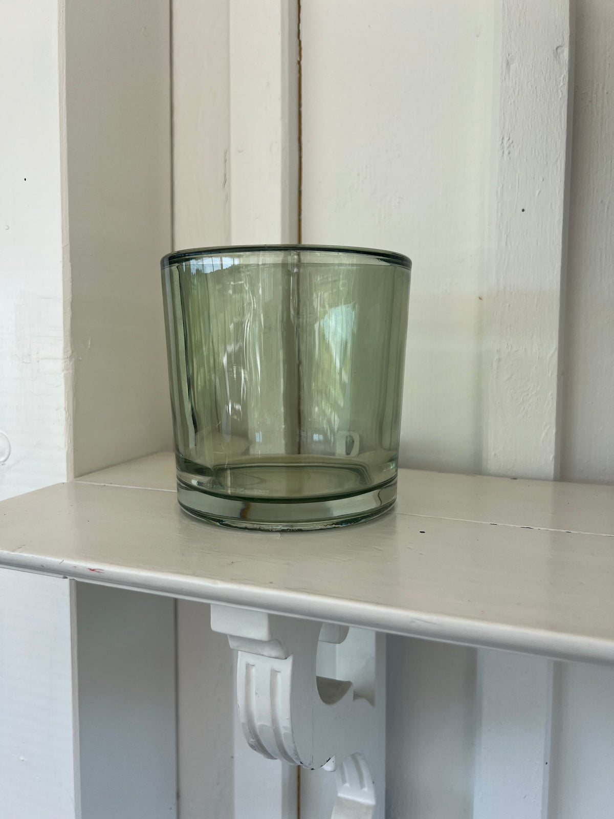 Stor ljuslykta i grönt glas