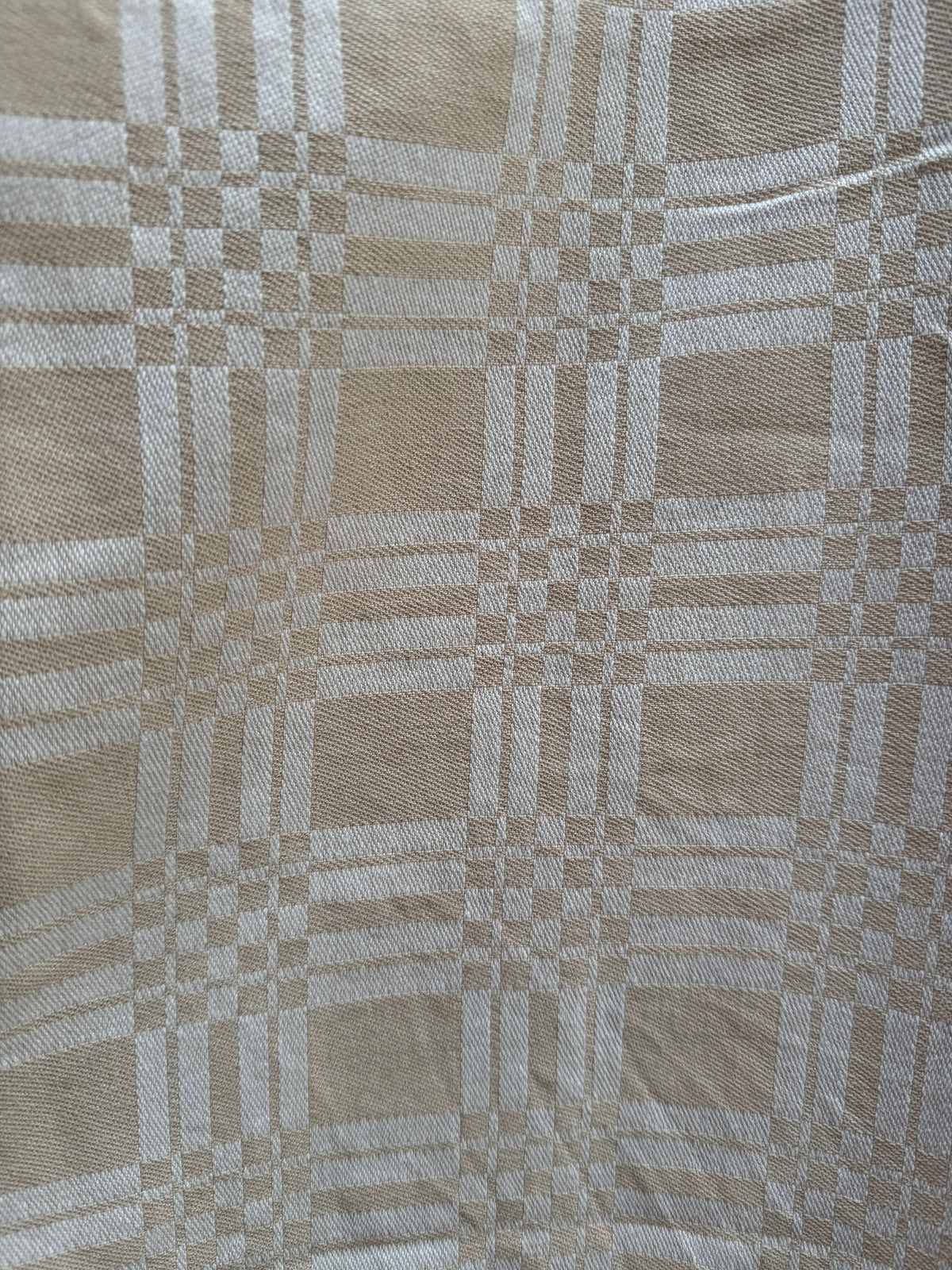 Beige mönstrad linneduk