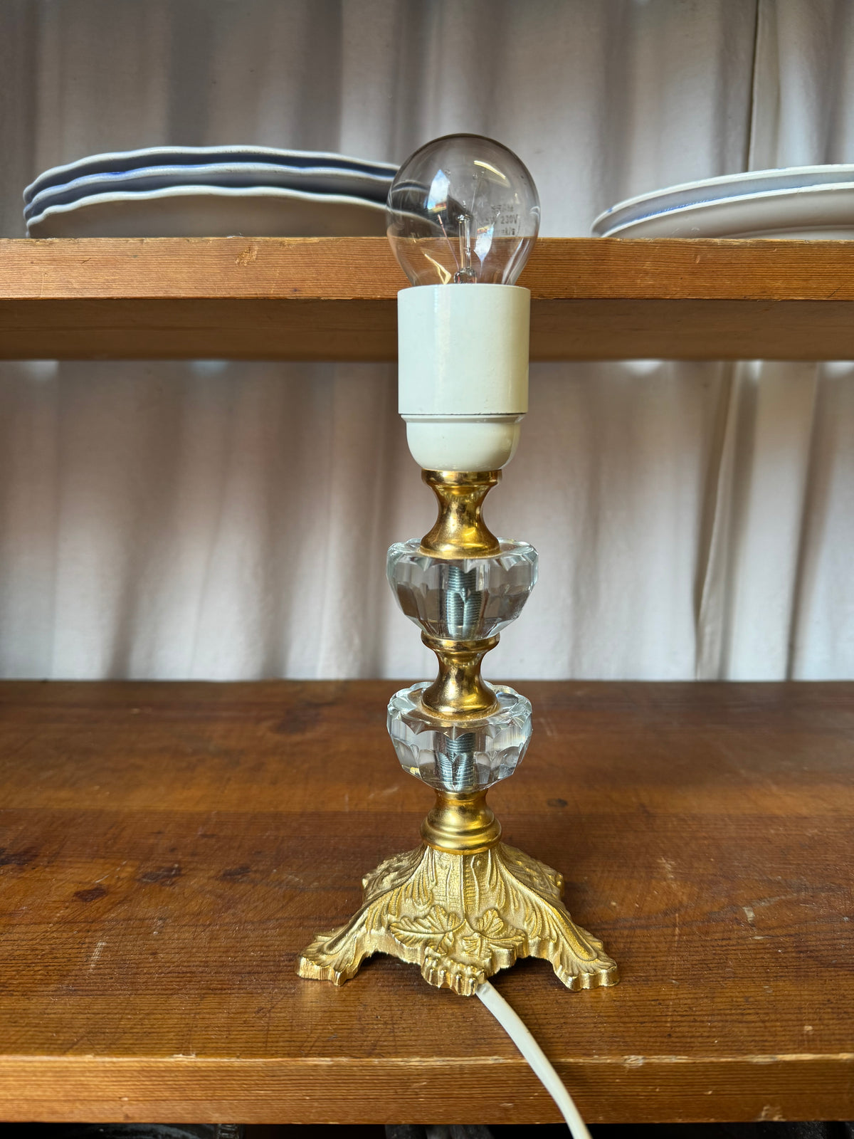 Lampfot i mässing och glas