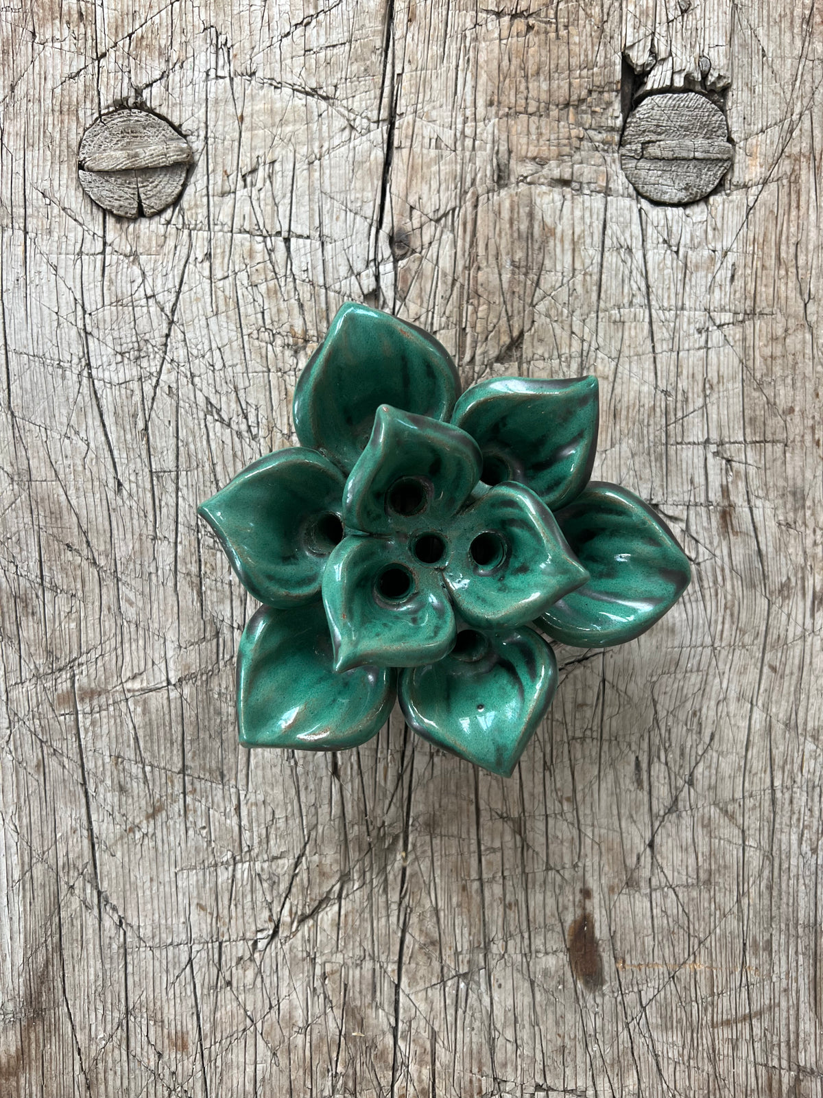 Blomsterfakir i grön keramik