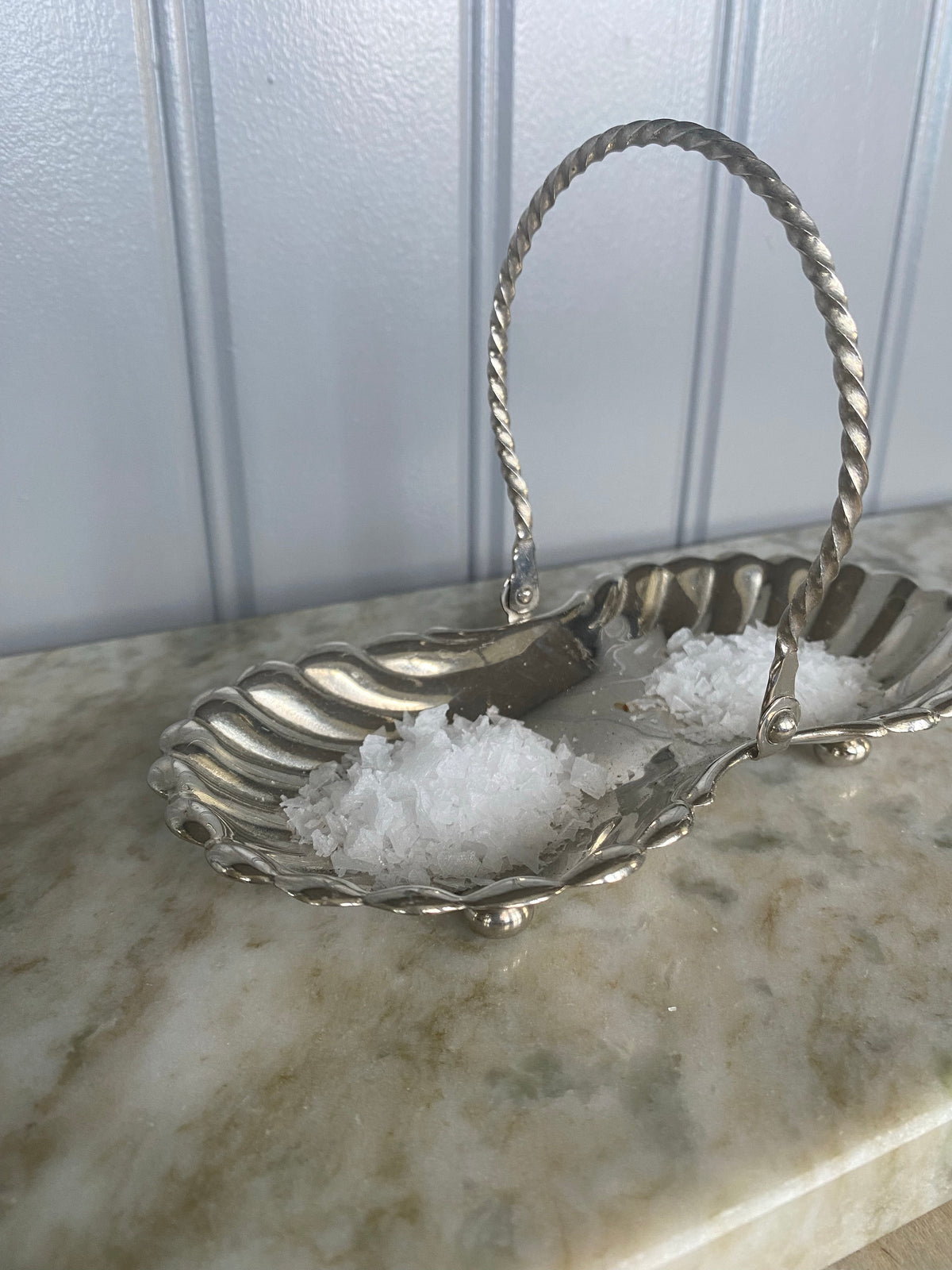 Dubbelt snäckfat med handtag
