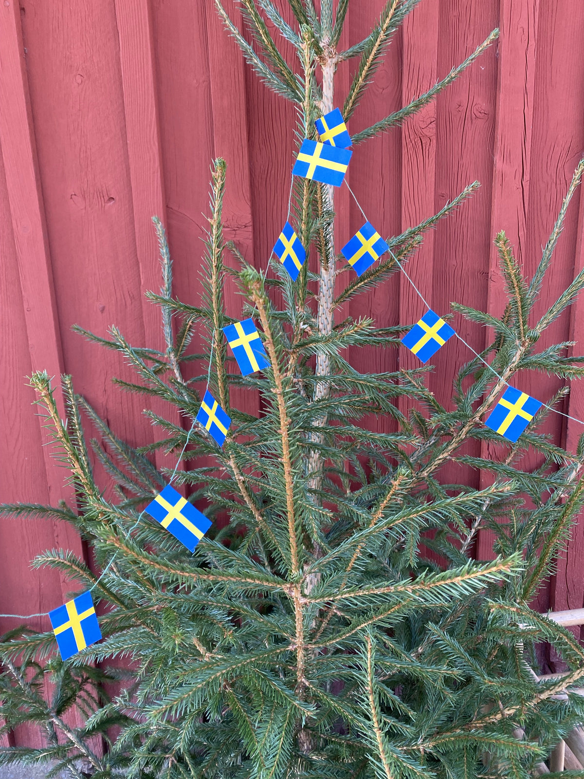 Äldre flaggspel till julgranen