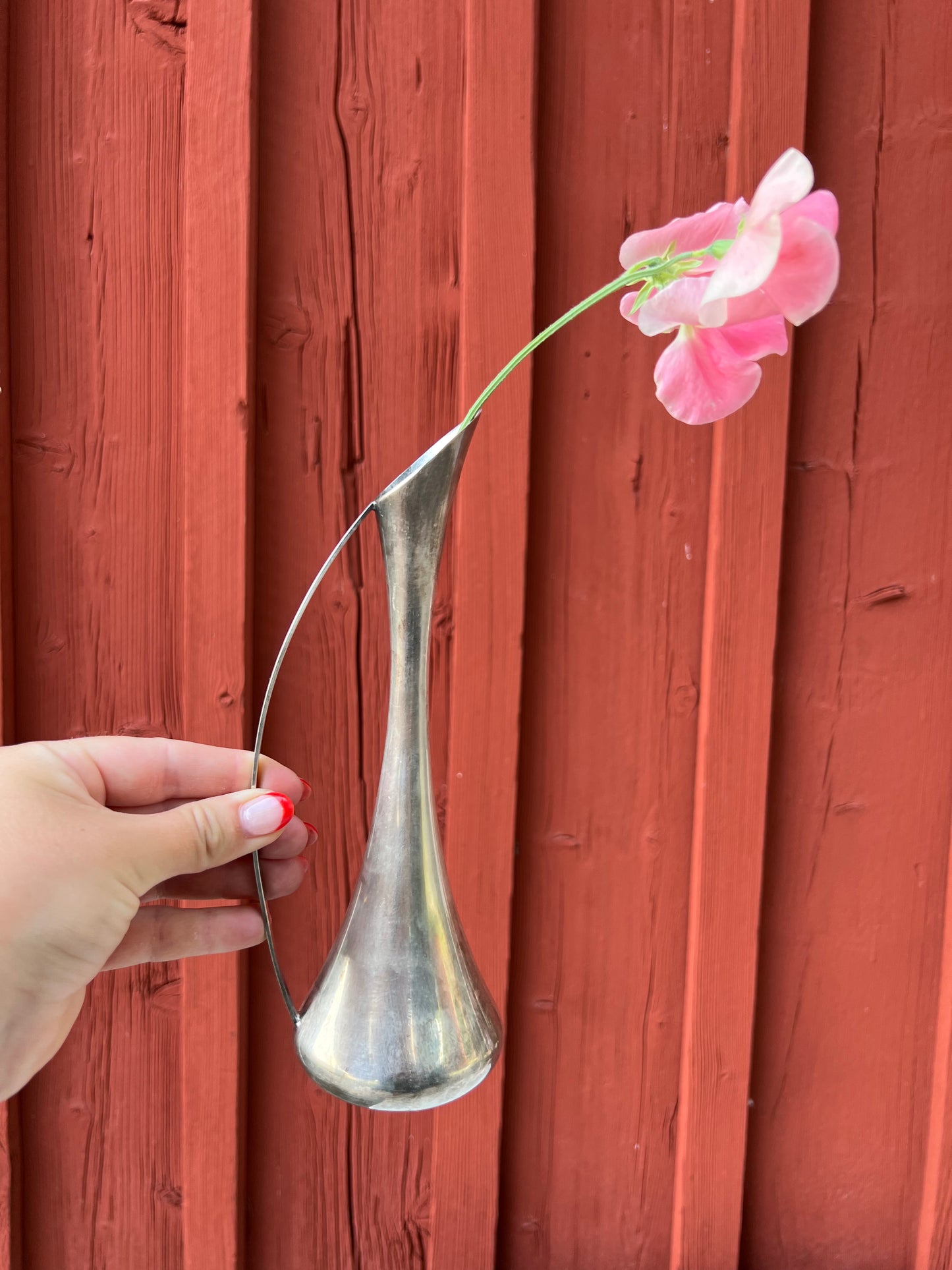 Vacker vas med handtag