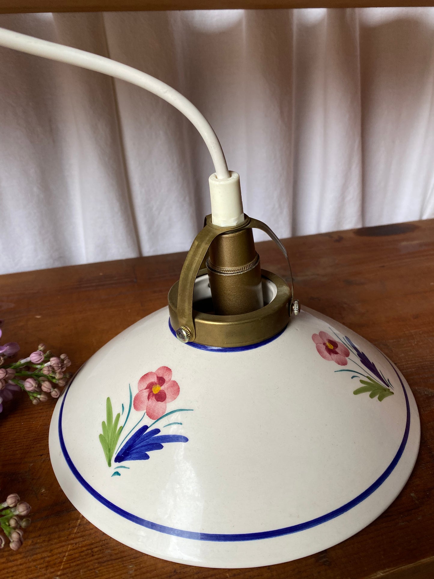 Skomakarlampa med blommor