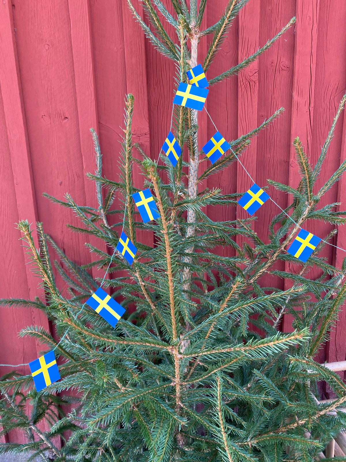 Äldre flaggspel till julgranen