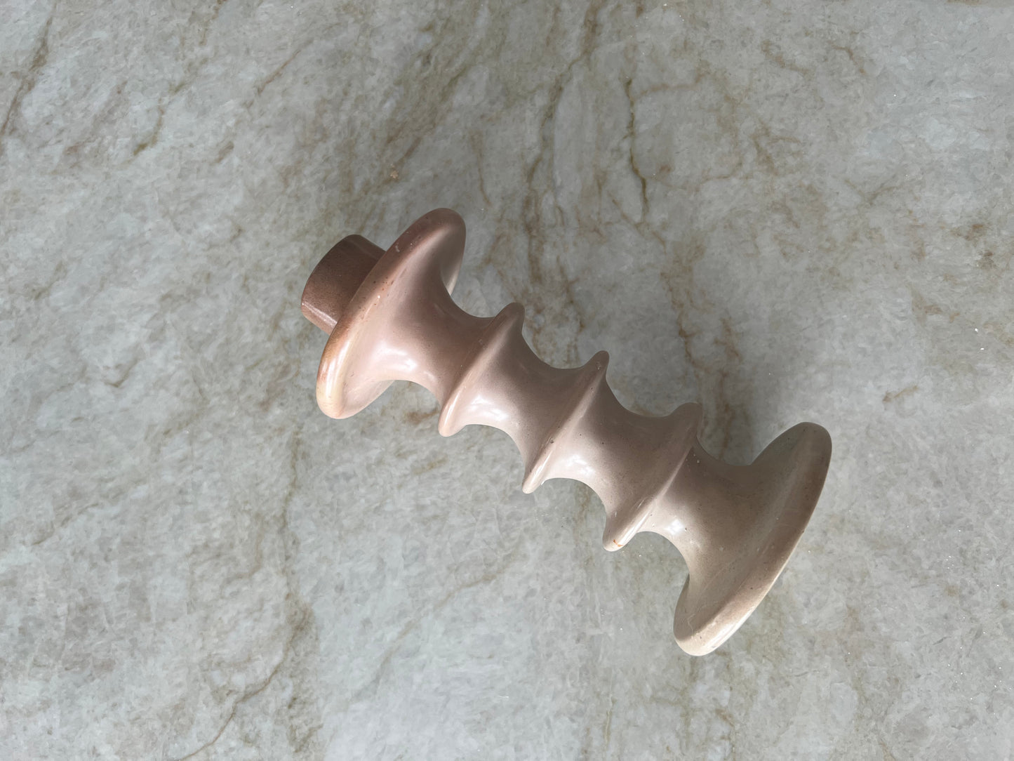 Snurrad ljusstake i rosa