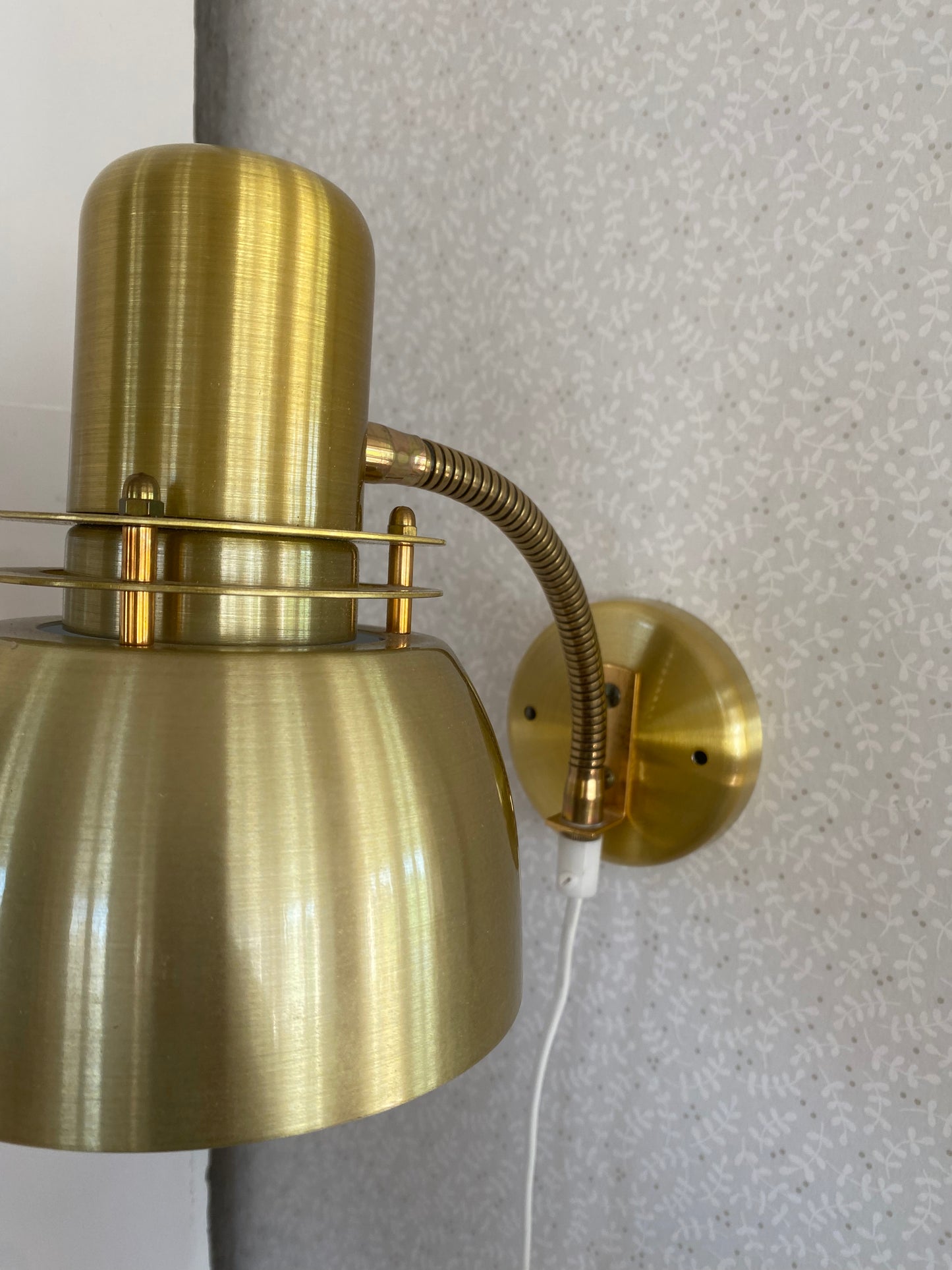Vägglampa i mässing