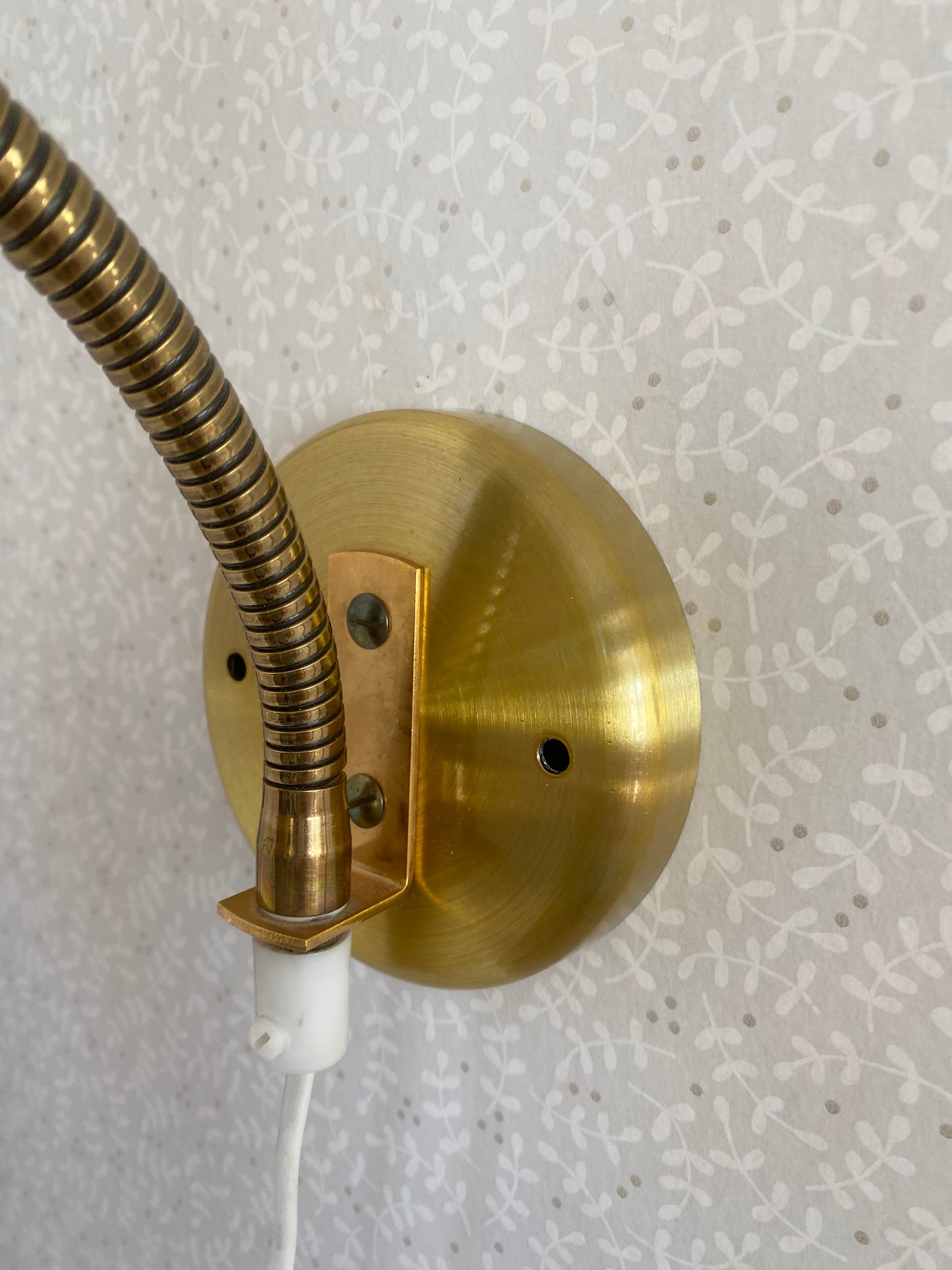 Vägglampa i mässing